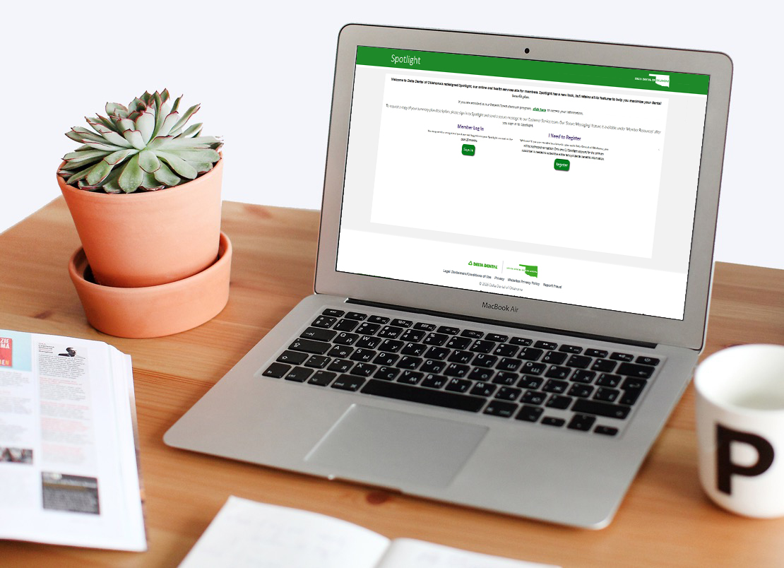 Delta Dental Spotlight website open on a laptop on a desk